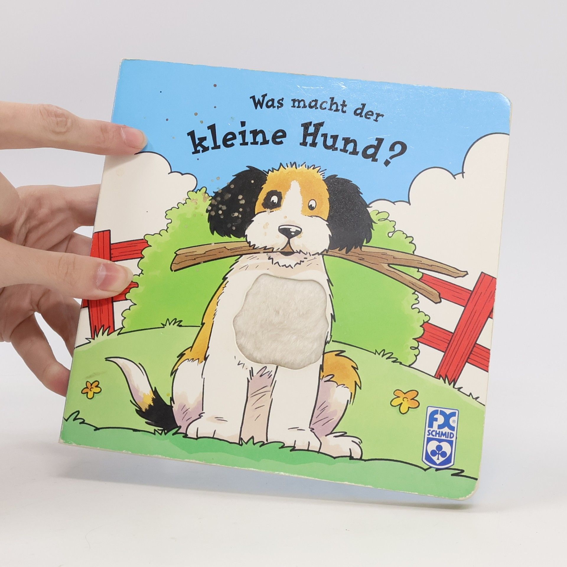 Was macht der kleine Hund?