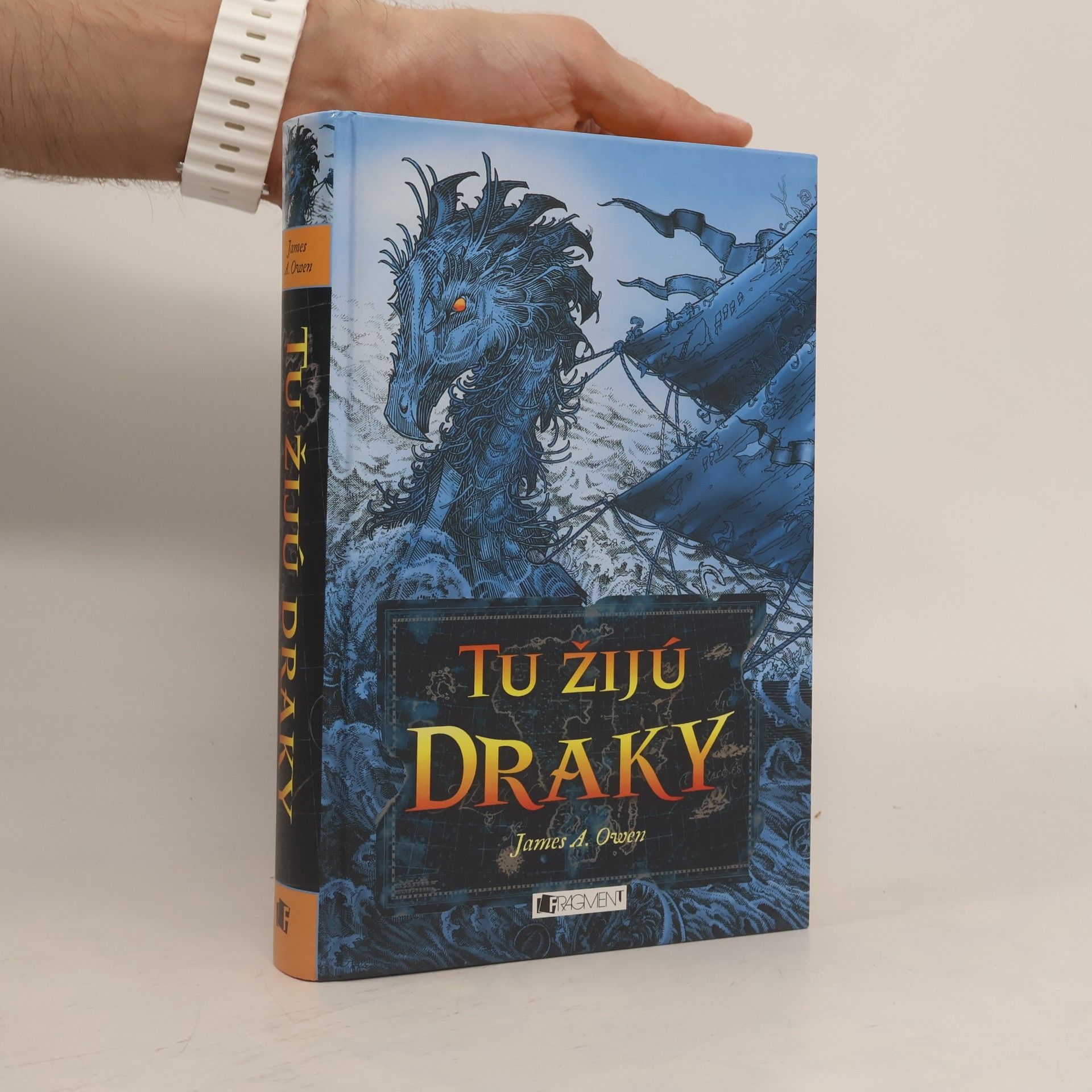 James A. Owen Tu žijú draky