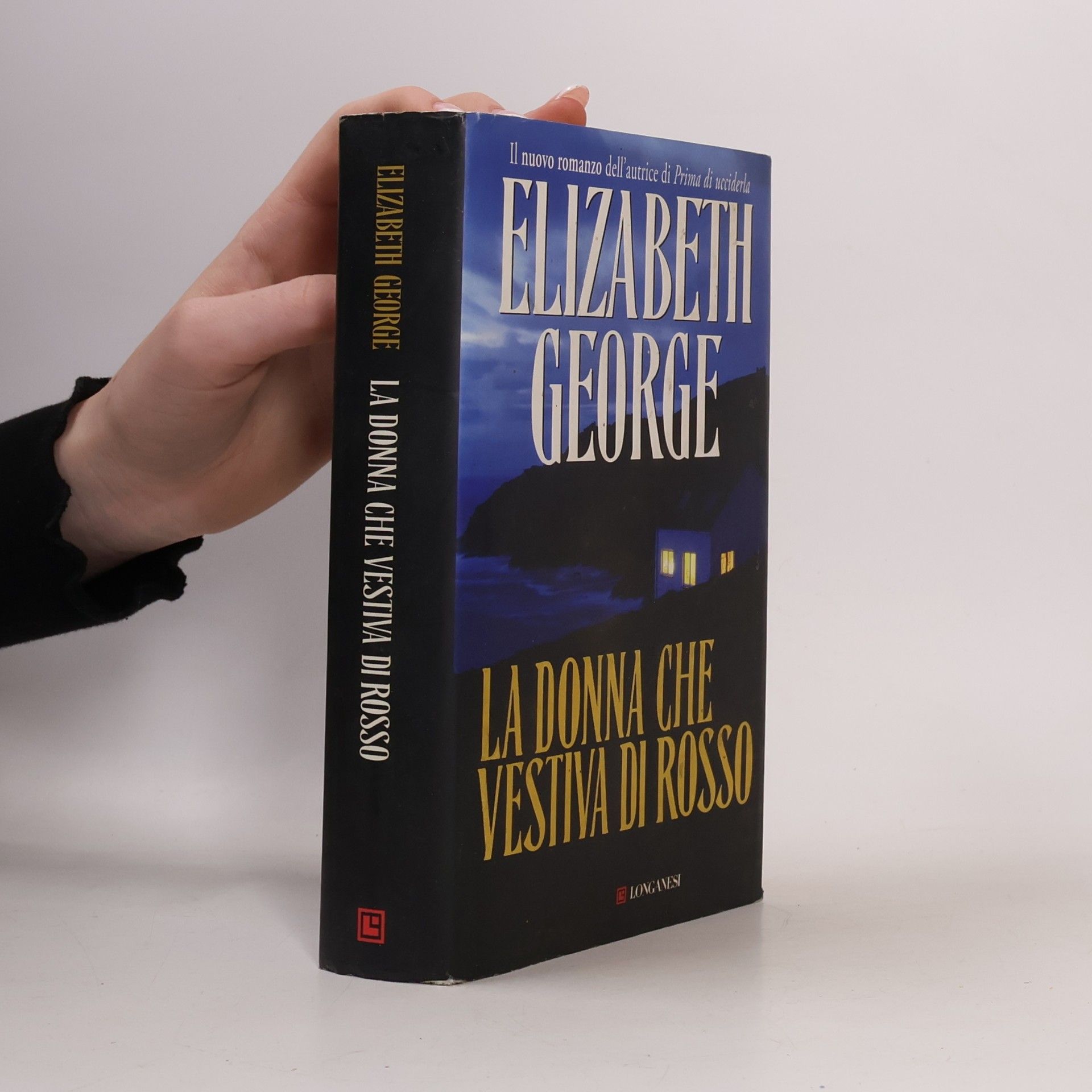 Elizabeth George La donna che vestiva di rosso