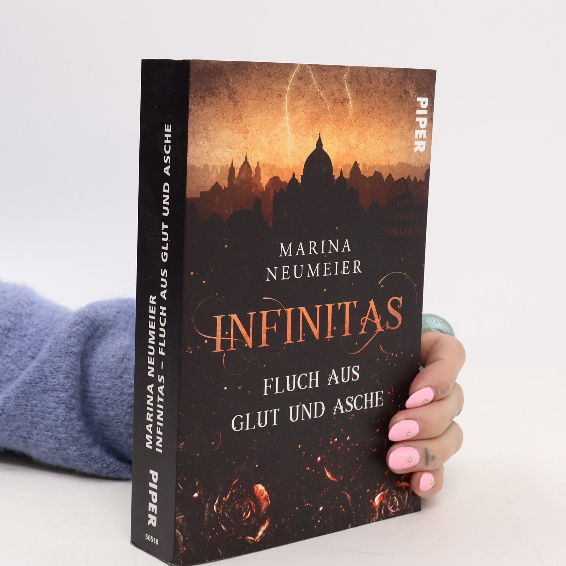 Infinitas – Fluch aus Glut und Asche