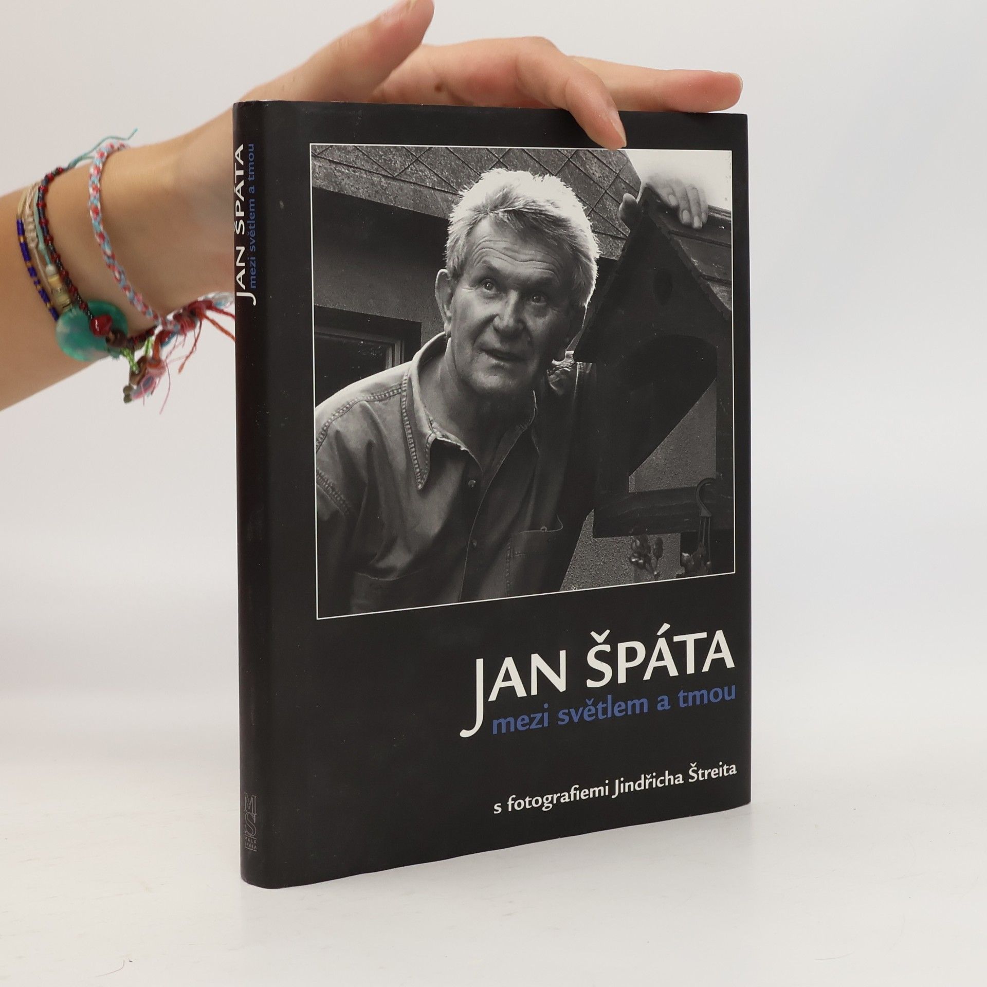 Jan Špáta mezi světlem a tmou: Sloupky a fejetony s fotografiemi Jindřicha Štreita