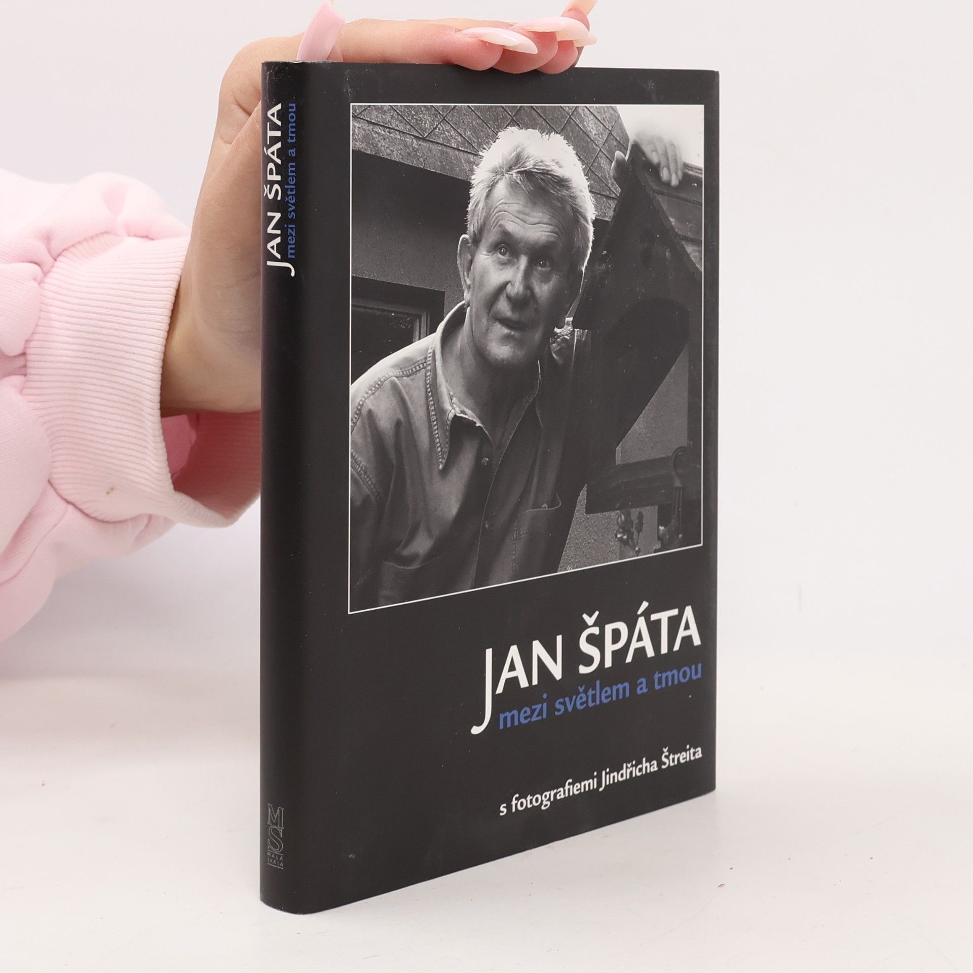 Jan Špáta mezi světlem a tmou: Sloupky a fejetony s fotografiemi Jindřicha Štreita