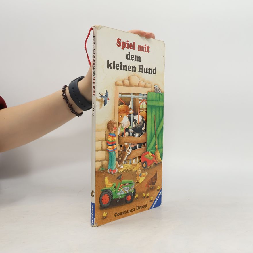 Constanza Droop Spiel mit dem kleinen Hund. Mit e. Papphund am Leseband